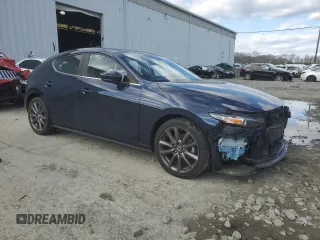 2020 Mazda 3 Preferred with VIN JM1BPBMM4L1159907, listed as a Copart auction lot 52510115 with 57,736 mi miles and Salvage Title. Bid and sale history available at DreamBid. Image 4.