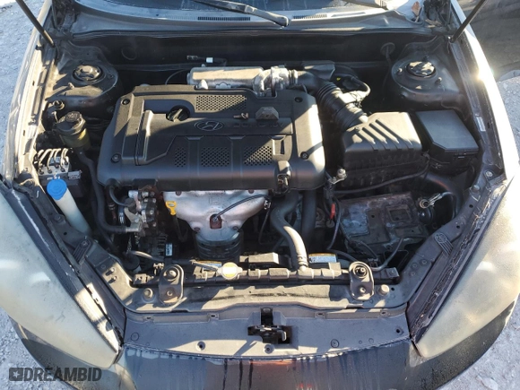 2008 Hyundai Tiburon GS with VIN KMHHM66DX8U291983, listed as a Copart auction lot 74586874 with 111,572 mi miles and Salvage Title. Bid and sale history available at carsss.com. Image 11.