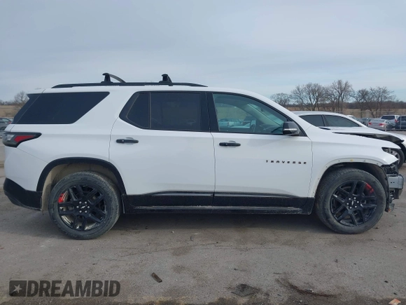 2018 Chevrolet Traverse Premier z VIN 1GNEVJKW0JJ229036, wystawiony jako IAAI lot #41866737 z przebiegiem 126 794 mil mil oraz . Historia ofert i sprzedaży dostępna na DreamBid. Obrazek 14.