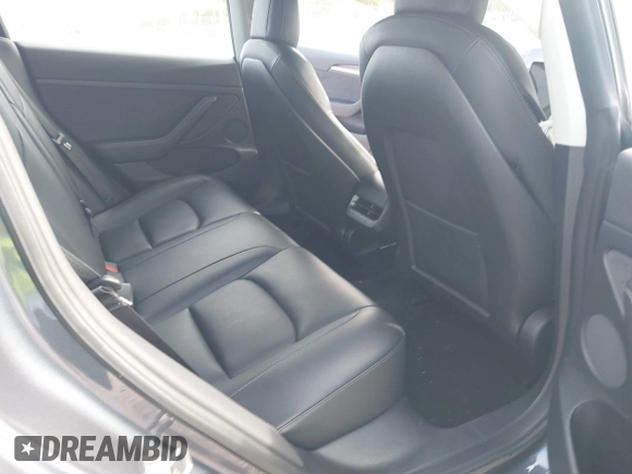 2023 Tesla Model 3 z VIN 5YJ3E1EA0PF403168, wystawiony jako IAAI lot #42002584 z przebiegiem 35 875 mil mil oraz . Historia ofert i sprzedaży dostępna na DreamBid. Obrazek 8.