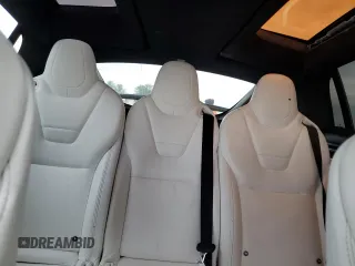 2016 Tesla Model X 70D z VIN 5YJXCAE29GF006512, wystawiony jako Copart lot #57517885 z przebiegiem Nie podano mil oraz Szkoda całkowita • Salvage title. Historia ofert i sprzedaży dostępna na DreamBid. Obrazek 10.