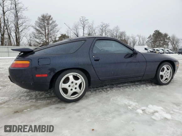 1993 Porsche 928 z VIN WP0AA2929PS815135, wystawiony jako Copart lot #86840514 z przebiegiem 69 263 mil mil oraz Szkody całkowita. Historia ofert i sprzedaży dostępna na DreamBid. Obrazek 3.