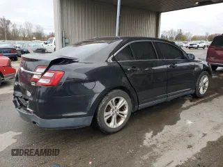 2015 Ford Taurus SEL with VIN 1FAHP2E94FG137935, listed as a Copart auction lot 80921824 with 172,324 mi miles and Salvage Title. Bid and sale history available at DreamBid. Image 3.