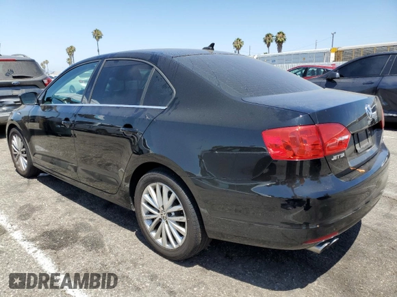 2014 Volkswagen Jetta TDI w/Premium with VIN 3VWLL7AJ8EM367587, listed as a Copart auction lot 63670815 with 129,289 mi miles and Clean title. Bid and sale history available at DreamBid. Image 2.