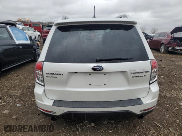 2011 Subaru Forester with VIN JF2SHBHC2BH719557, listed as a Copart auction lot 78809654 with 91,325 mi miles and Salvage title. Bid and sale history available at DreamBid. Image 6.