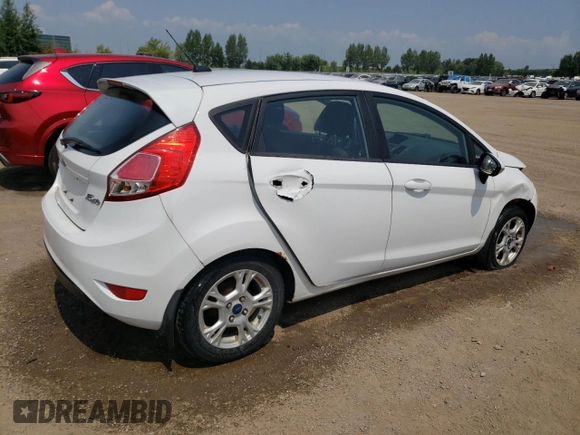 2015 Ford Fiesta SE z VIN 3FADP4EJ7FM169000, wystawiony jako Copart lot #64402674 z przebiegiem 191 221 mil mil oraz Szkoda całkowita • Salvage title. Historia ofert i sprzedaży dostępna na DreamBid. Obrazek 3.