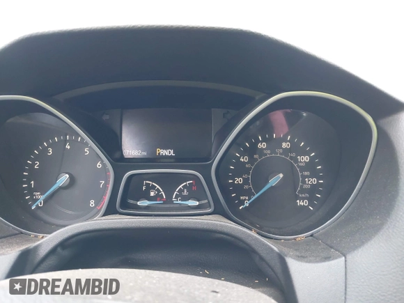 2018 Ford Focus SE with VIN 1FADP3F28JL302634, listed as a IAAI auction lot 42103219 with 71,682 mi miles and . Bid and sale history available at DreamBid. Image 7.