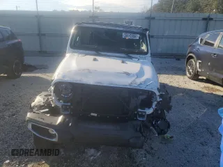 2025 Jeep Wrangler Sahara with VIN 1C4PJXENXSW500496, listed as a Copart auction lot 41934515 with 6,265 mi miles and Salvage Title. Bid and sale history available at DreamBid. Image 5.