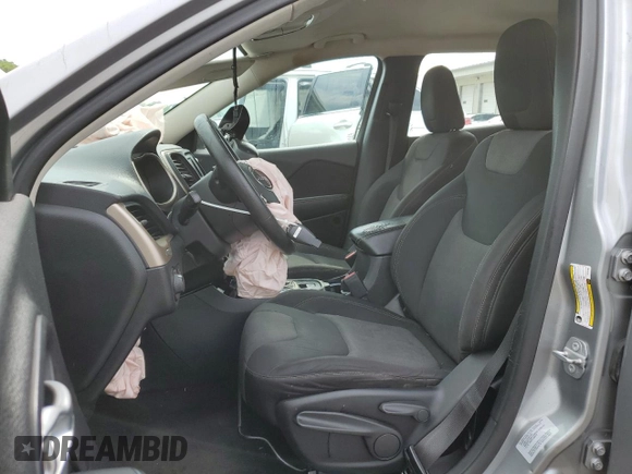 2015 Jeep Cherokee Sport with VIN 1C4PJLAB8FW761989, listed as a Copart auction lot 56869675 with 181,347 mi miles and Salvage title. Bid and sale history available at DreamBid. Image 7.