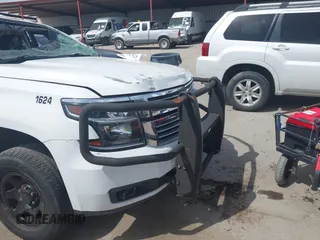 2016 Chevrolet Tahoe Commercial z VIN 1GNLCDEC9GR299693, wystawiony jako IAAI lot #42630221 z przebiegiem 127 081 mil mil oraz . Historia ofert i sprzedaży dostępna na DreamBid. Obrazek 20.