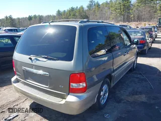 2003 Kia Sedona LX with VIN KNDUP131536414349, listed as a IAAI auction lot 41836104 with 70,130 mi miles. Bid and sale history available at carsss.com. Image 4.