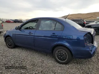 2010 Hyundai Accent GLS with VIN KMHCN4AC1AU426977, listed as a Copart auction lot 84705694 with 148,594 mi miles and Salvage Title. Bid and sale history available at carsss.com. Image 2.