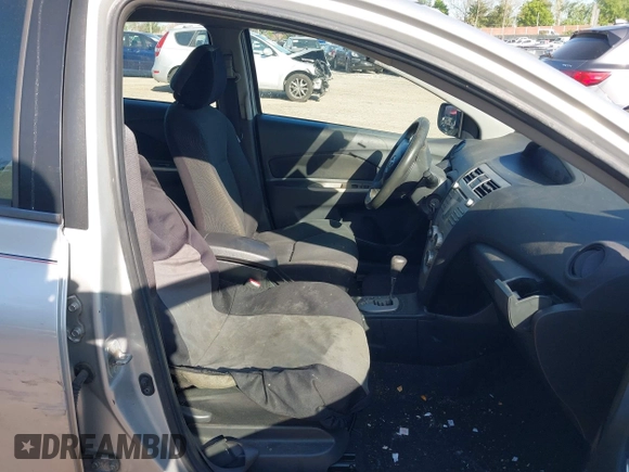 2009 Toyota Yaris with VIN JTDBT903891307874, listed as a IAAI auction lot 42150366 with 218,350 mi miles. Bid and sale history available at carsss.com. Image 5.