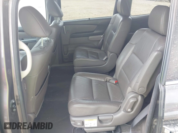 2012 Honda Odyssey EX-L with VIN 5FNRL5H60CB054277, listed as a IAAI auction lot 42459861 with 205,722 mi miles and . Bid and sale history available at DreamBid. Image 8.