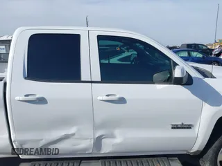 2014 Chevrolet Silverado 1500 LT with VIN 1GCRCREH0EZ399724, listed as a IAAI auction lot 41572451 with 61,799 mi miles and . Bid and sale history available at DreamBid. Image 13.