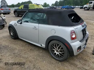 2011 MINI Convertible S z VIN WMWZP3C51BTX84117, wystawiony jako Copart lot #57636385 z przebiegiem 130 700 mil mil oraz Szkoda całkowita • Salvage title. Historia ofert i sprzedaży dostępna na DreamBid. Obrazek 2.