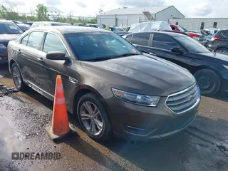 2015 Ford Taurus SEL with VIN 1FAHP2E87FG194170, listed as a IAAI auction lot 42184749 with 222,609 mi miles and . Bid and sale history available at carsss.com. Image 1.