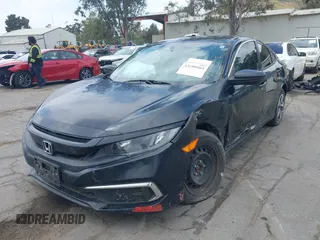2020 Honda Civic Sedan LX with VIN 19XFC2F65LE205947, listed as a IAAI auction lot 33199503 with 1 mi miles. Bid and sale history available at carsss.com. Image 2.