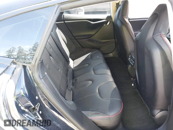 2013 Tesla Model S Performance z VIN 5YJSA1DP2DFP06669, wystawiony jako IAAI lot #42161357 z przebiegiem 177 710 mil mil oraz . Historia ofert i sprzedaży dostępna na DreamBid. Obrazek 8.