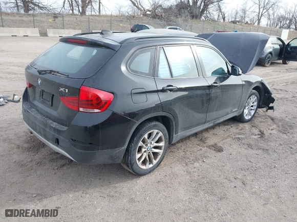 2015 BMW X1 xDrive28i with VIN WBAVL1C57FVY28954, listed as a IAAI auction lot 41857286 with 1 mi miles. Bid and sale history available at carsss.com. Image 4.