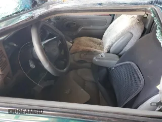 1997 GMC Sierra 1500 z VIN 2GTEK19RXV1501674, wystawiony jako Copart lot #59061595 z przebiegiem 138 998 mil mil oraz Szkoda całkowita • Salvage title. Historia ofert i sprzedaży dostępna na DreamBid. Obrazek 7.