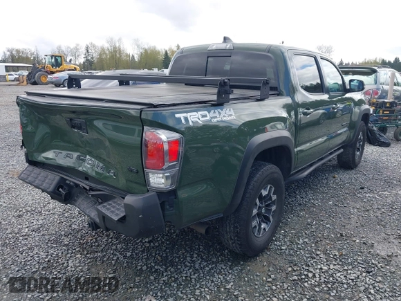 2021 Toyota Tacoma 4WD SR with VIN 3TMCZ5AN5MM437358, listed as a IAAI auction lot 42000234 with 47,295 mi miles. Bid and sale history available at carsss.com. Image 4.