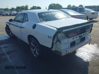 2015 Dodge Challenger SXT with VIN 2C3CDZAG3FH861134, listed as a IAAI auction lot 42224973 with 130,157 mi miles and . Bid and sale history available at DreamBid. Image 3.