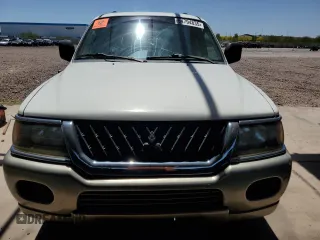 2002 Mitsubishi Montero XLS z VIN JA4MT31R42J048762, wystawiony jako Copart lot #54794835 z przebiegiem 124 978 mil mil oraz Czysty tytuł • Clean title. Historia ofert i sprzedaży dostępna na DreamBid. Obrazek 5.