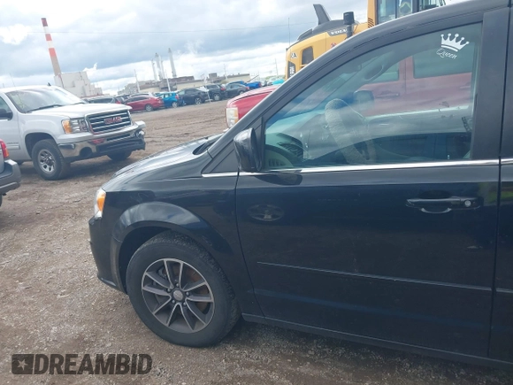 2017 Dodge Grand Caravan SXT with VIN 2C4RDGCG1HR773185, listed as a IAAI auction lot 42201139 with 166,718 mi miles and . Bid and sale history available at DreamBid. Image 14.