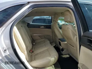 2014 Lincoln MKZ z VIN 3LN6L2G91ER831043, wystawiony jako Copart lot #63109715 z przebiegiem Nie podano mil oraz Szkoda całkowita • Salvage title. Historia ofert i sprzedaży dostępna na DreamBid. Obrazek 10.