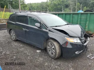 2016 Honda Odyssey Touring Elite with VIN 5FNRL5H90GB061827, listed as a Copart auction lot 61271695 with Not provided miles and Salvage title. Bid and sale history available at DreamBid. Image 4.