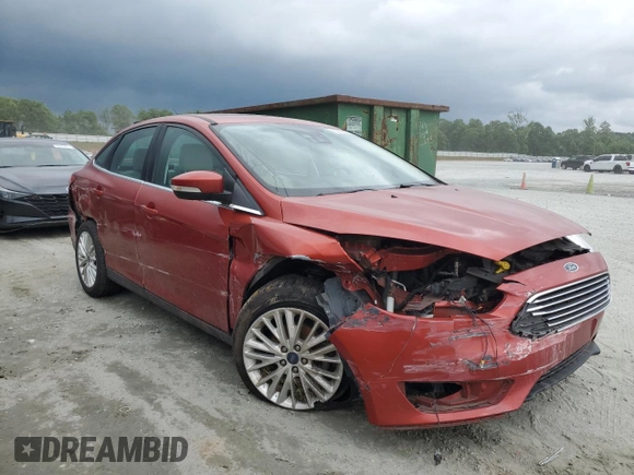 2018 Ford Focus Titanium with VIN 1FADP3J26JL284299, listed as a Copart auction lot 58908325 with 79,331 mi miles and Salvage title. Bid and sale history available at DreamBid. Image 4.
