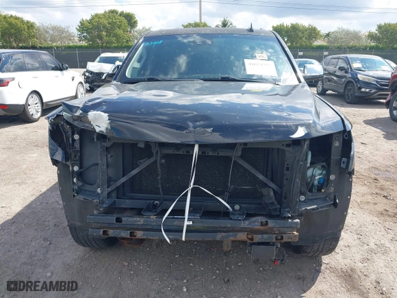 2015 Chevrolet Tahoe LTZ with VIN 1GNSCCKC7FR746028, listed as a IAAI auction lot 41674775 with 198,067 mi miles. Bid and sale history available at carsss.com. Image 6.
