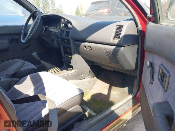 1991 Toyota Corolla z VIN JT2AE94V7M3017214, wystawiony jako IAAI lot #41959814 z przebiegiem 189 458 mil mil oraz . Historia ofert i sprzedaży dostępna na DreamBid. Obrazek 5.