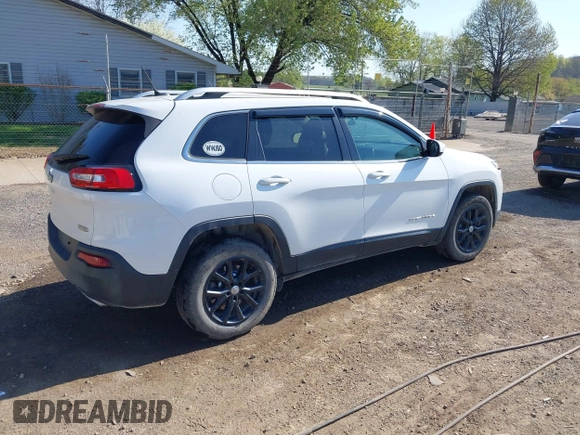 2015 Jeep Cherokee Latitude with VIN 1C4PJMCS0FW790017, listed as a IAAI auction lot 42097988 with 105,990 mi miles and . Bid and sale history available at DreamBid. Image 4.