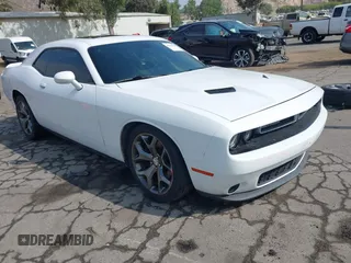 2015 Dodge Challenger SXT Plus with VIN 2C3CDZBG7FH911158, listed as a IAAI auction lot 42396867 with 90,880 mi miles and . Bid and sale history available at DreamBid. Image 1.