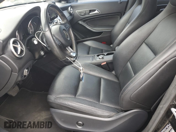 2015 Mercedes-Benz CLA 250 with VIN WDDSJ4EB2FN253961, listed as a Copart auction lot 49778695 with 93,409 mi miles and Salvage Title. Bid and sale history available at DreamBid. Image 7.