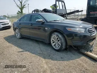 2013 Ford Taurus Limited z VIN 1FAHP2F80DG210284, wystawiony jako Copart lot #60356585 z przebiegiem 163 750 mil mil oraz Szkoda całkowita • Salvage title. Historia ofert i sprzedaży dostępna na DreamBid. Obrazek 14.