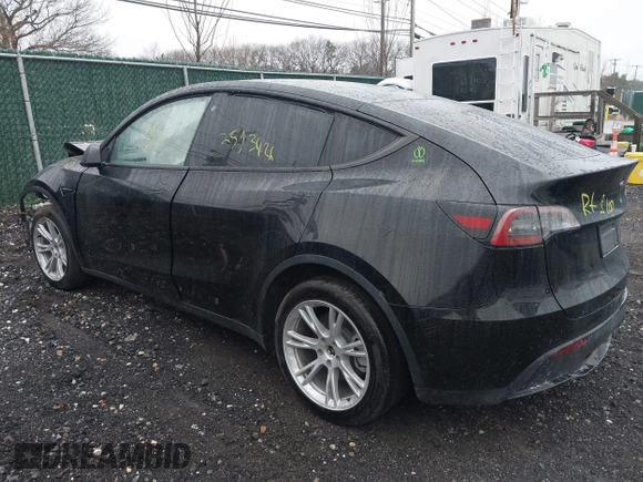 2023 Tesla Model Y Long Range with VIN 7SAYGDEEXPA121625, listed as a IAAI auction lot 41959524 with Not Provided miles and . Bid and sale history available at carsss.com. Image 3.