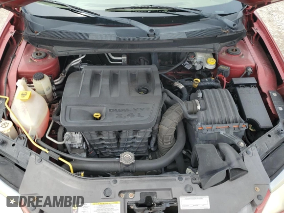 2009 Chrysler Sebring Touring z VIN 1C3LC56B29N560827, wystawiony jako Copart lot #58845265 z przebiegiem 102 081 mil mil oraz Szkoda całkowita • Salvage title. Historia ofert i sprzedaży dostępna na DreamBid. Obrazek 11.