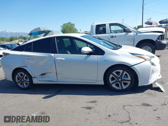 2017 Toyota Prius Two with VIN JTDKARFUXH3536565, listed as a IAAI auction lot 42374515 with 125,240 mi miles and . Bid and sale history available at DreamBid. Image 13.