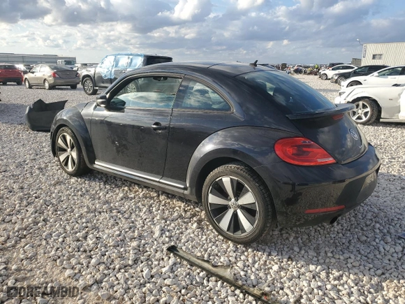 2012 Volkswagen Beetle 2.0T Turbo PZEV with VIN 3VWVA7AT1CM618883, listed as a Copart auction lot 85873174 with 100,482 mi miles and Salvage Title. Bid and sale history available at carsss.com. Image 2.