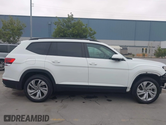 2022 Volkswagen Atlas SE with VIN 1V2WR2CA2NC517904, listed as a IAAI auction lot 42110920 with 34,799 mi miles and . Bid and sale history available at DreamBid. Image 14.