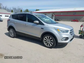 2017 Ford Escape Titanium with VIN 1FMCU9JD3HUE03686, listed as a IAAI auction lot 42016950 with 82,299 mi miles. Bid and sale history available at carsss.com. Image 1.