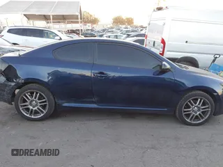 2006 Scion tC with VIN JTKDE167560098683, listed as a IAAI auction lot 41277221 with 179,476 mi miles. Bid and sale history available at carsss.com. Image 13.