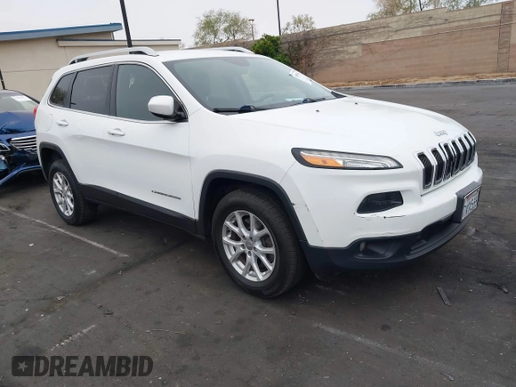2015 Jeep Cherokee Latitude with VIN 1C4PJLCB0FW761871, listed as a IAAI auction lot 42099336 with 213,049 mi miles and . Bid and sale history available at DreamBid. Image 1.
