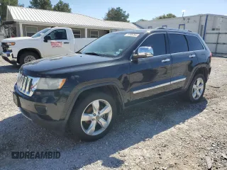 2013 Jeep Grand Cherokee Overland with VIN 1C4RJECG5DC595989, listed as a Copart auction lot 73385354 with 157,876 mi miles and Clean Title. Bid and sale history available at carsss.com. Image 1.