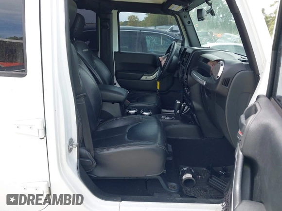 2015 Jeep Wrangler Unlimited Rubicon Hard Rock с VIN 1C4HJWFG7FL684057, выставлен на аукционе IAAI как лот 41963885 с пробегом 103 240 миль миль и . История ставок и продаж доступна на DreamBid. Изображение 5.