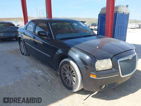 2009 Chrysler 300 Touring with VIN 2C3KA53V59H621936, listed as a IAAI auction lot 42112314 with 198,461 mi miles. Bid and sale history available at carsss.com. Image 1.
