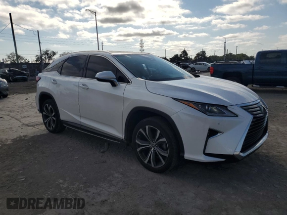 2019 Lexus RX 350 z VIN 2T2ZZMCA5KC133379, wystawiony jako Copart lot #88062035 z przebiegiem 128 962 mil mil oraz Szkoda całkowita • Salvage title. Historia ofert i sprzedaży dostępna na DreamBid. Obrazek 4.